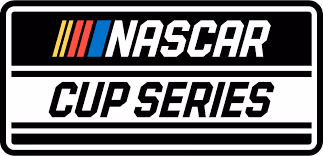 Logo with the word Talladega in bold red letters and Superspeedway in white below on a black background.