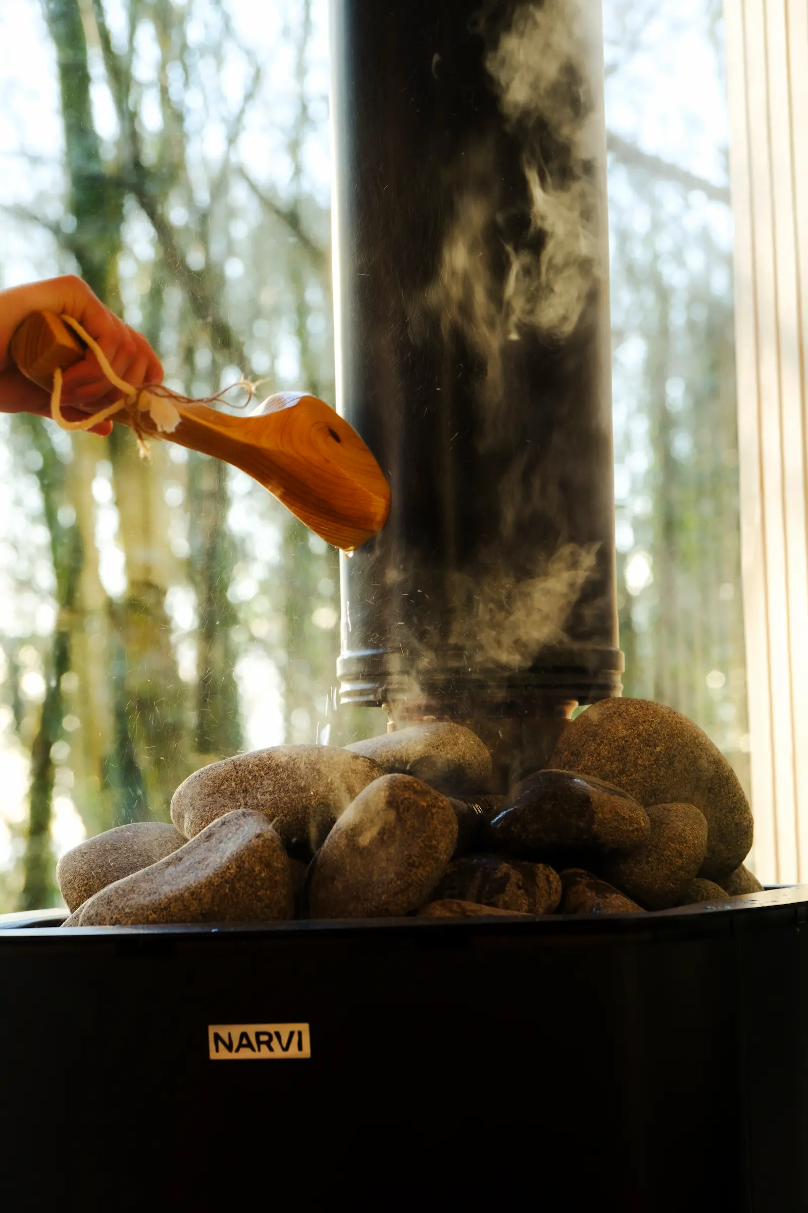 Sauna In The Woods ladle steam rocks burner