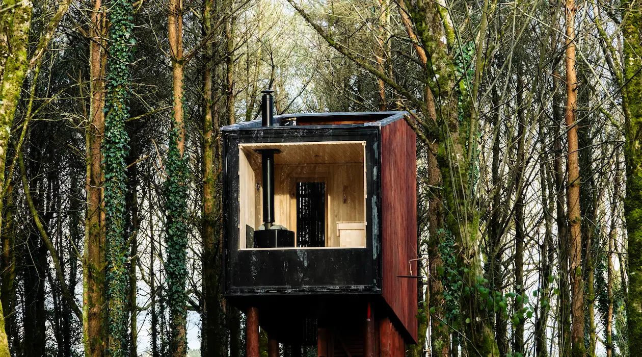 Sauna Cabin Under The Hills view in surrounded by woods