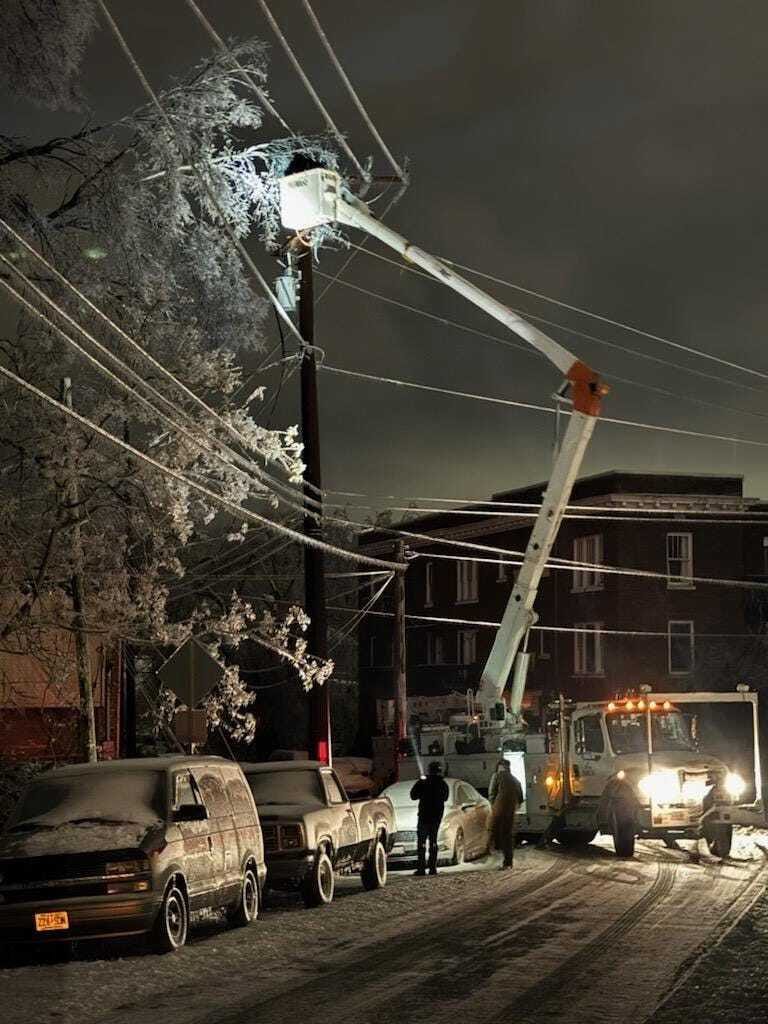 Utility lineworker restoring power