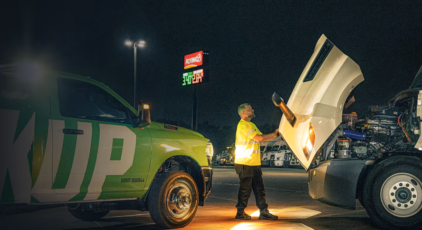 TruckUp mechanic opening a truck hood