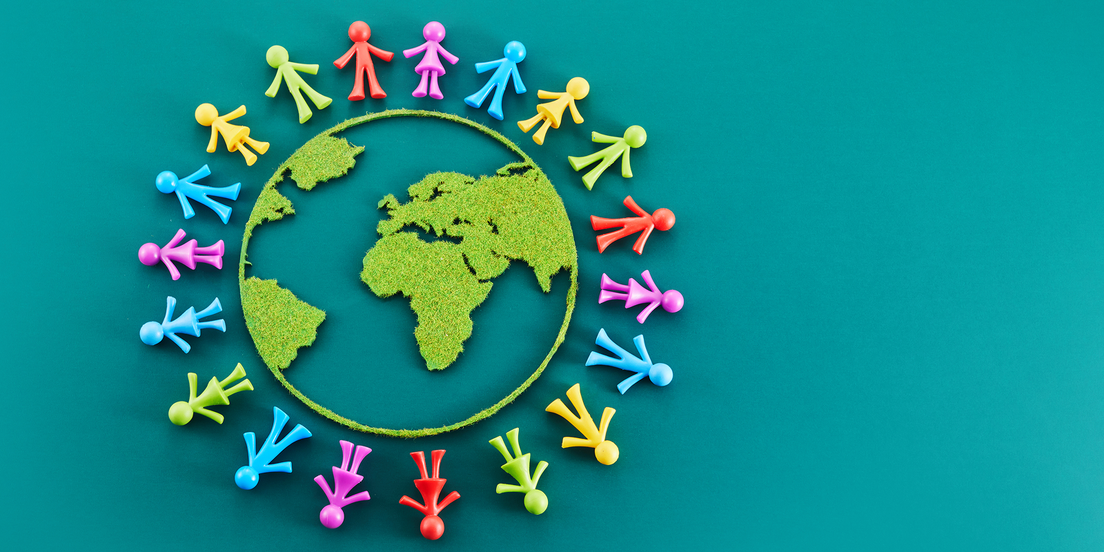 Green world map encircled by multicolored figures representing Wellthy’s global caregiving support and connection across countries