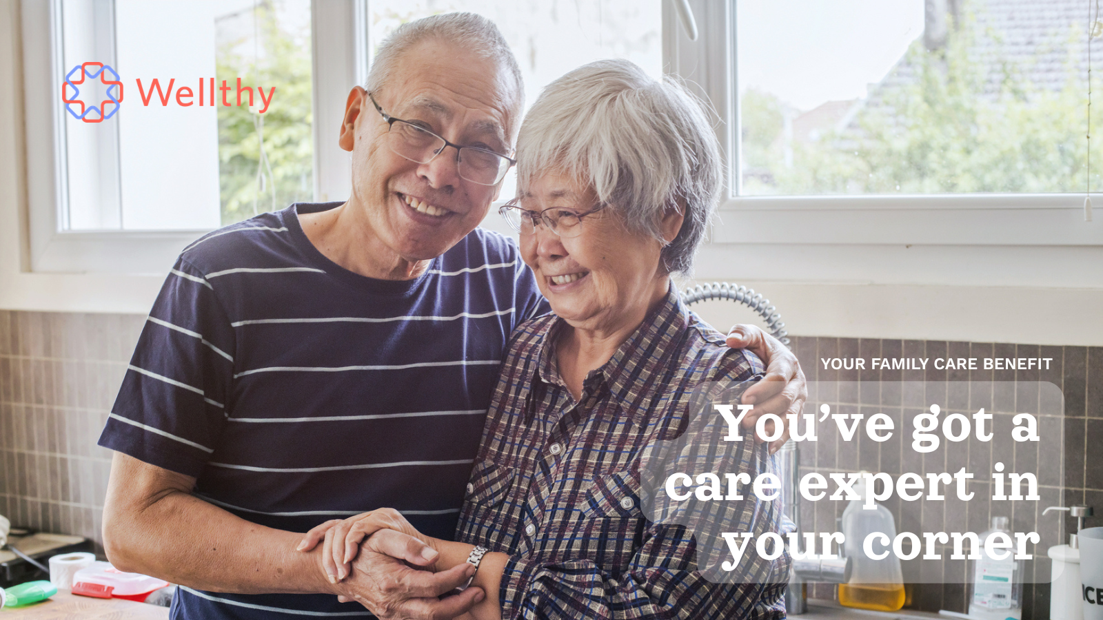 Promotional image for Wellthy featuring an older couple smiling together at home, with the message: “Your family care benefit: You’ve got a care expert in your corner.”