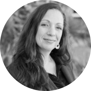 Black and white headshot of Gina