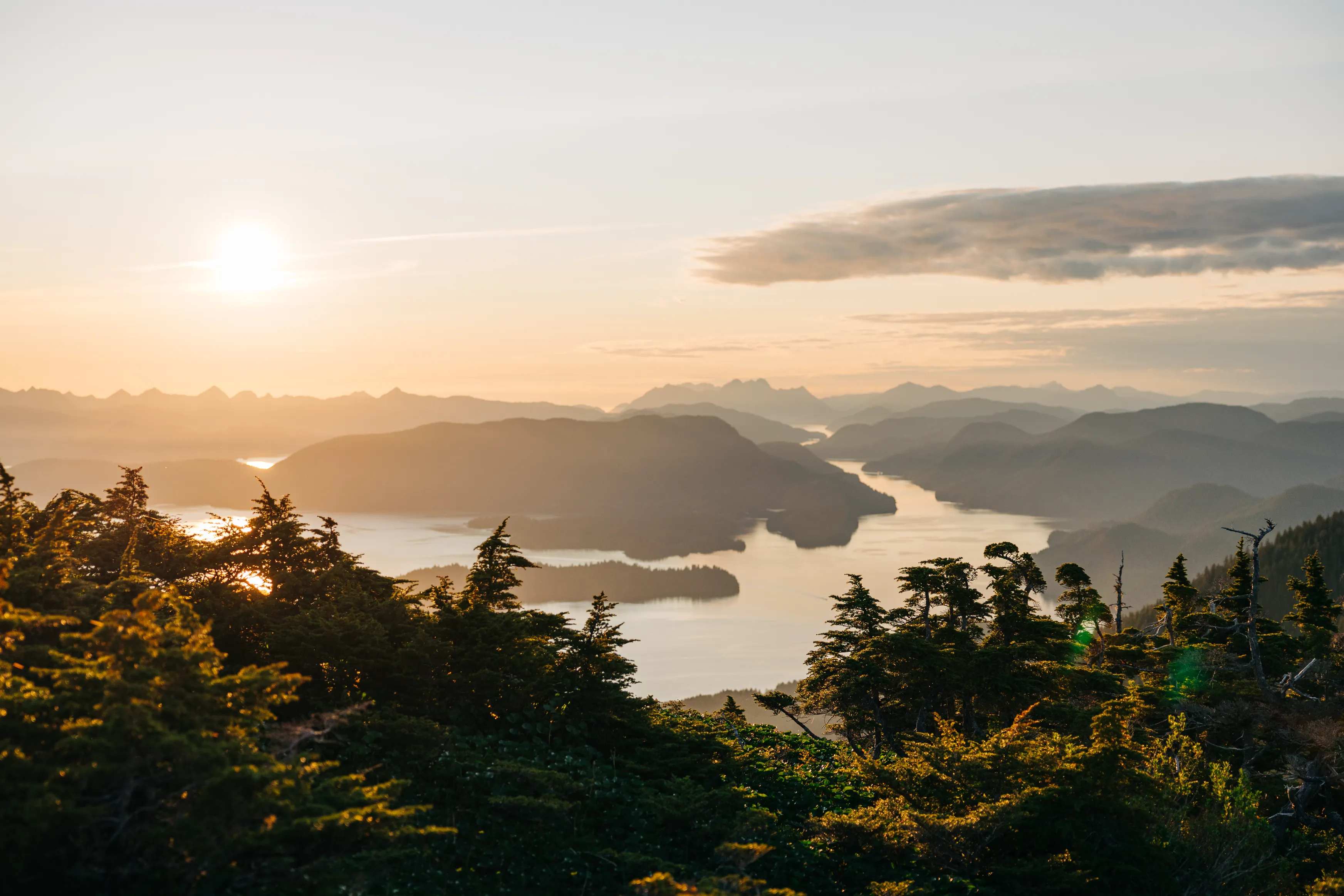 Sunset over the islands and channels of Sitka Sound from a mountain ridge