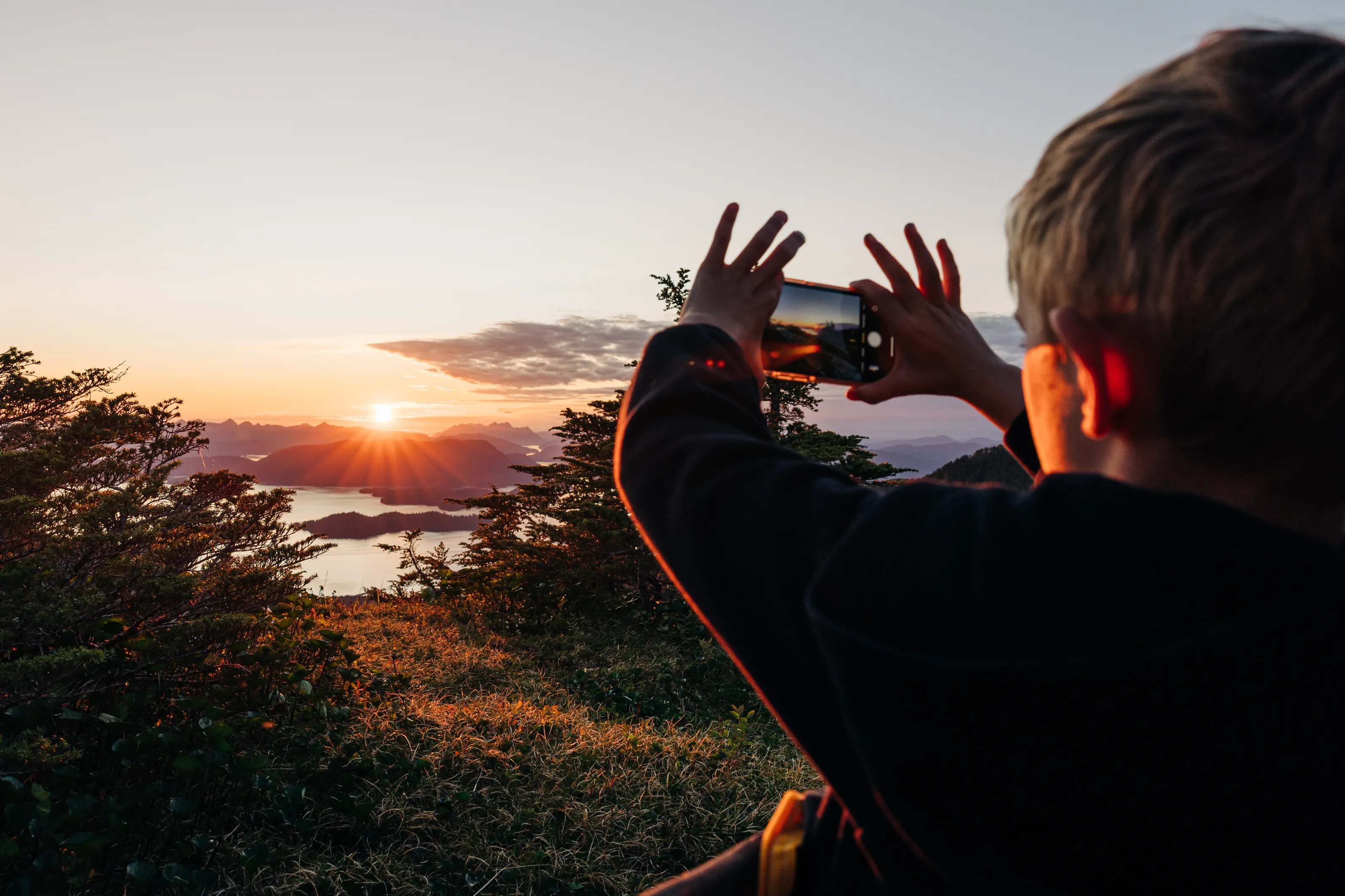 Expedition craft beached with bow ramp down on remote island