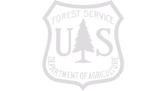 U.S. Forest Service shield logo with a tree in the center, labeled Department of Agriculture.