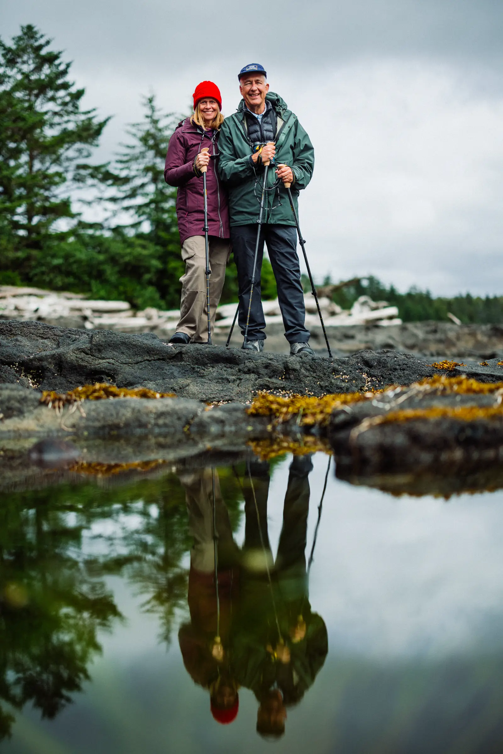 Family walking a remote beach near Sitka, Alaska