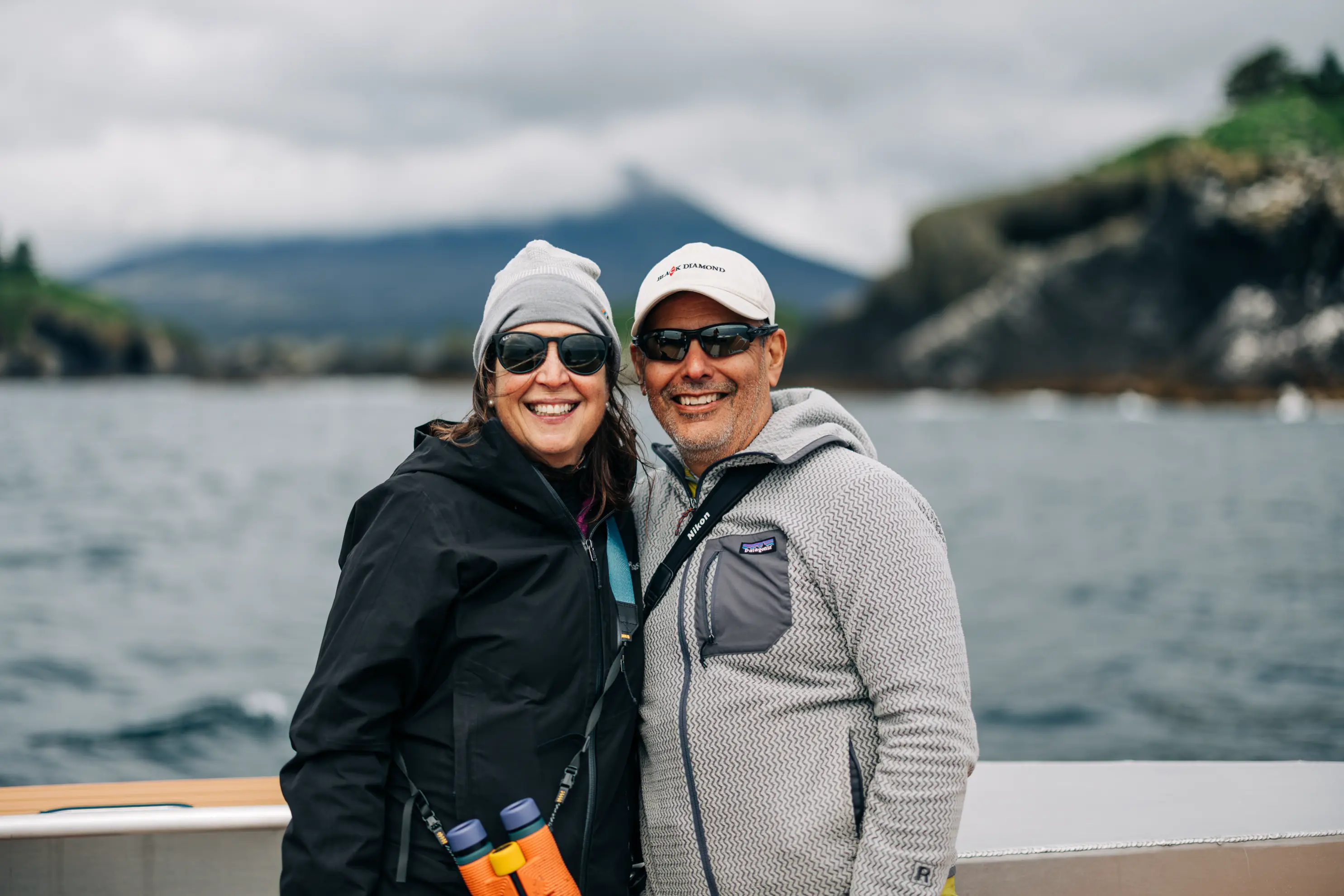 Ben Hamilton photographing wildlife from the boat in Sitka Sound