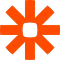 Zapier logo with orange asterisk-like shape and central square.