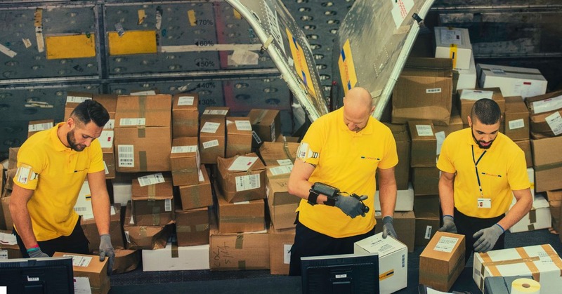 a warehouse worker's sorting boxes