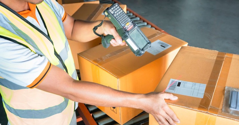 warehouse worker scanning the barcode