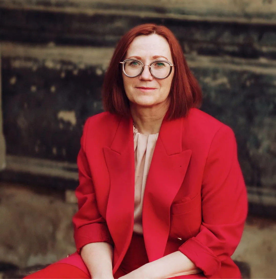 Woman in red blazer
