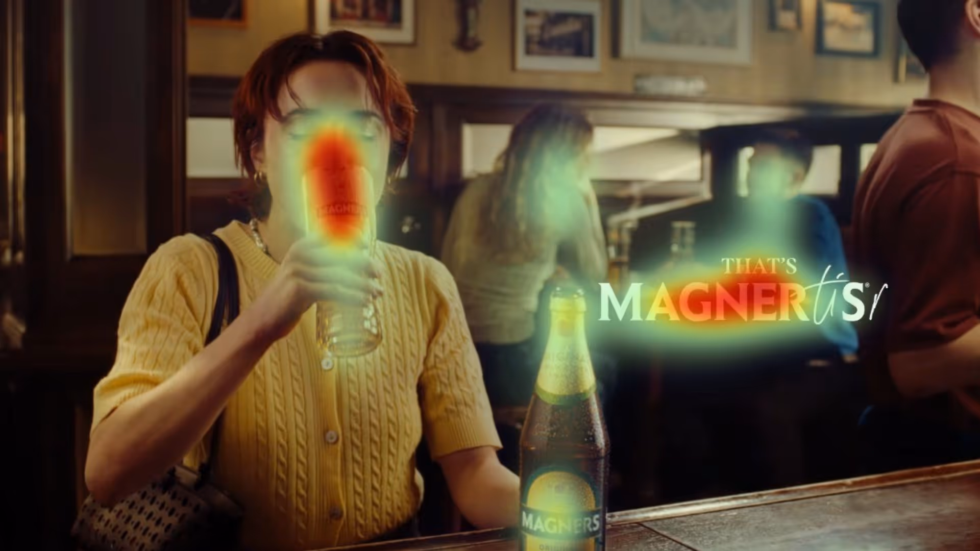 Heatmap analysis of Magners cider advertisement showing high visual attention on the drink, brand logo, and tagline ‘That’s Magners’ in a pub setting