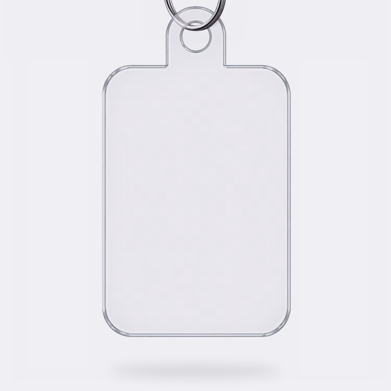 Clear rectangular keychain with rounded corners and a small circular attachment ring, shown against a light background.