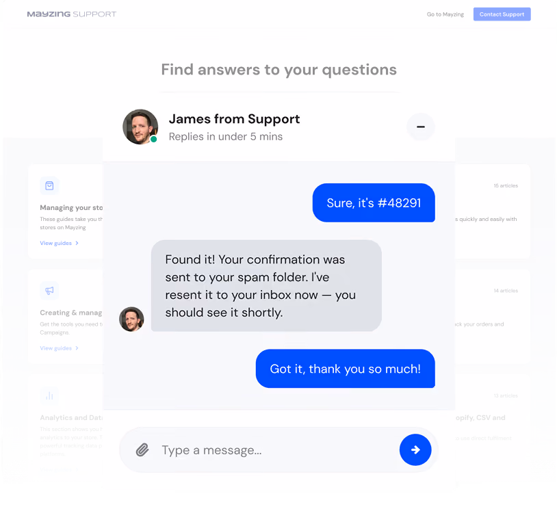 Screenshot of Mayzing support chat interface showing a conversation with James from Support. James replies that the confirmation was sent to the spam folder and has been resent to the inbox. The user responds with thanks. The interface includes options to view support guides for managing stores, creating campaigns, and analytics. A message input field with a paperclip icon and send button is visible.