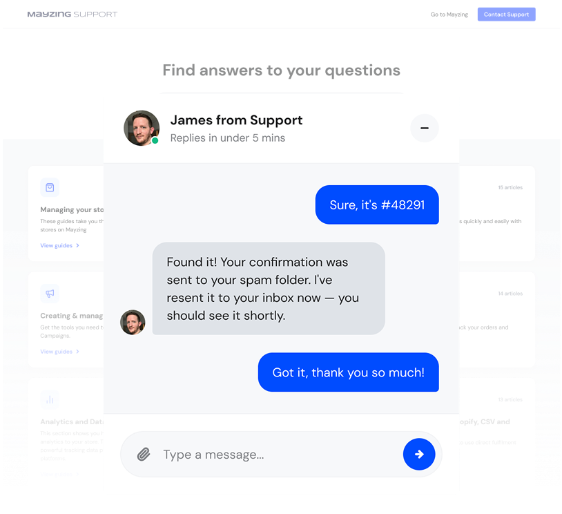 Screenshot of Mayzing support chat interface showing a conversation with James from Support. James replies that the confirmation was sent to the spam folder and has been resent to the inbox. The user responds with thanks. The interface includes options to view support guides for managing stores, creating campaigns, and analytics. A message input field with a paperclip icon and send button is visible.
