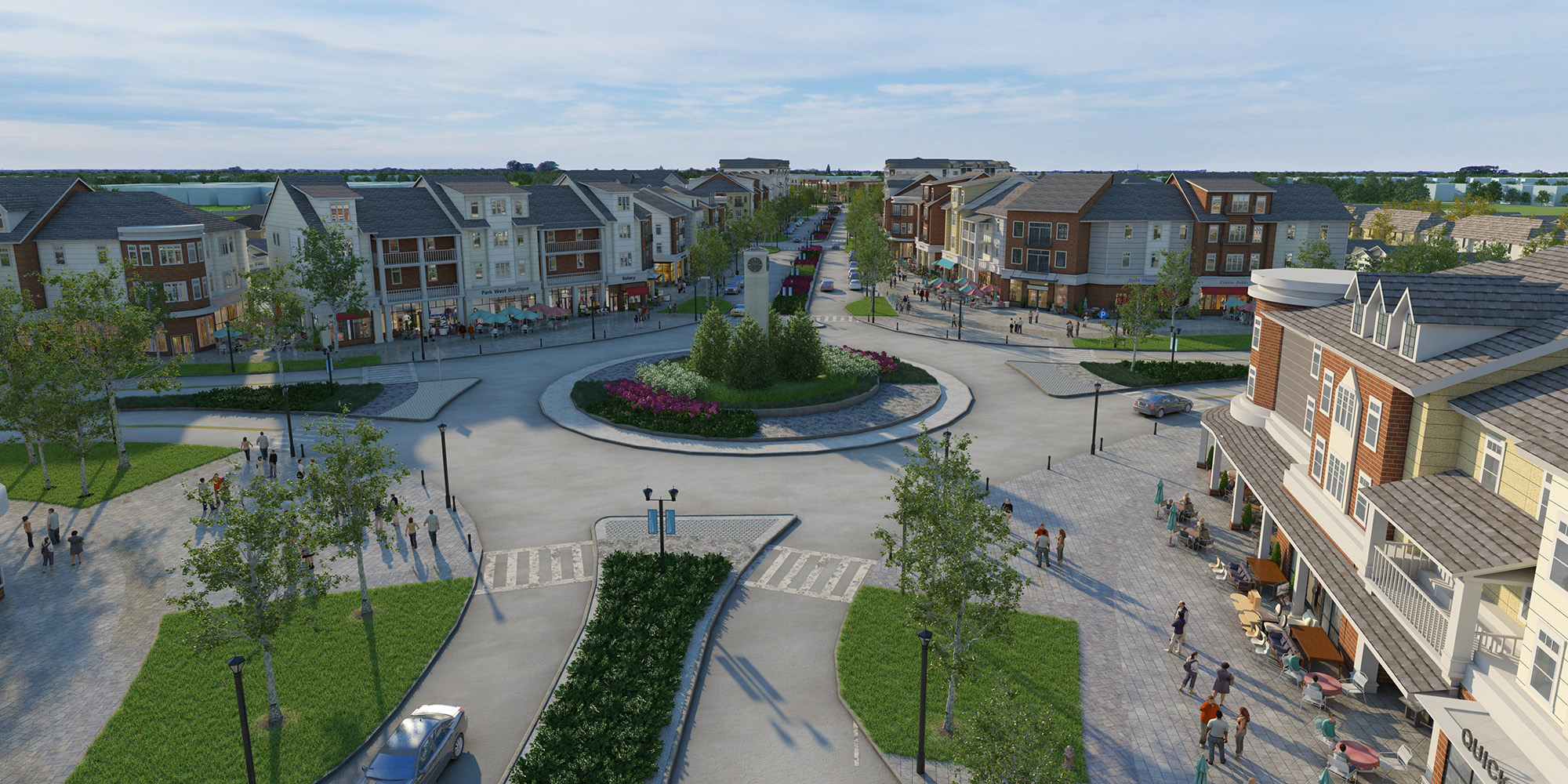 Bird's eye view of a mixed-use community development showcasing pedestrian-friendly streets and retail storefronts.