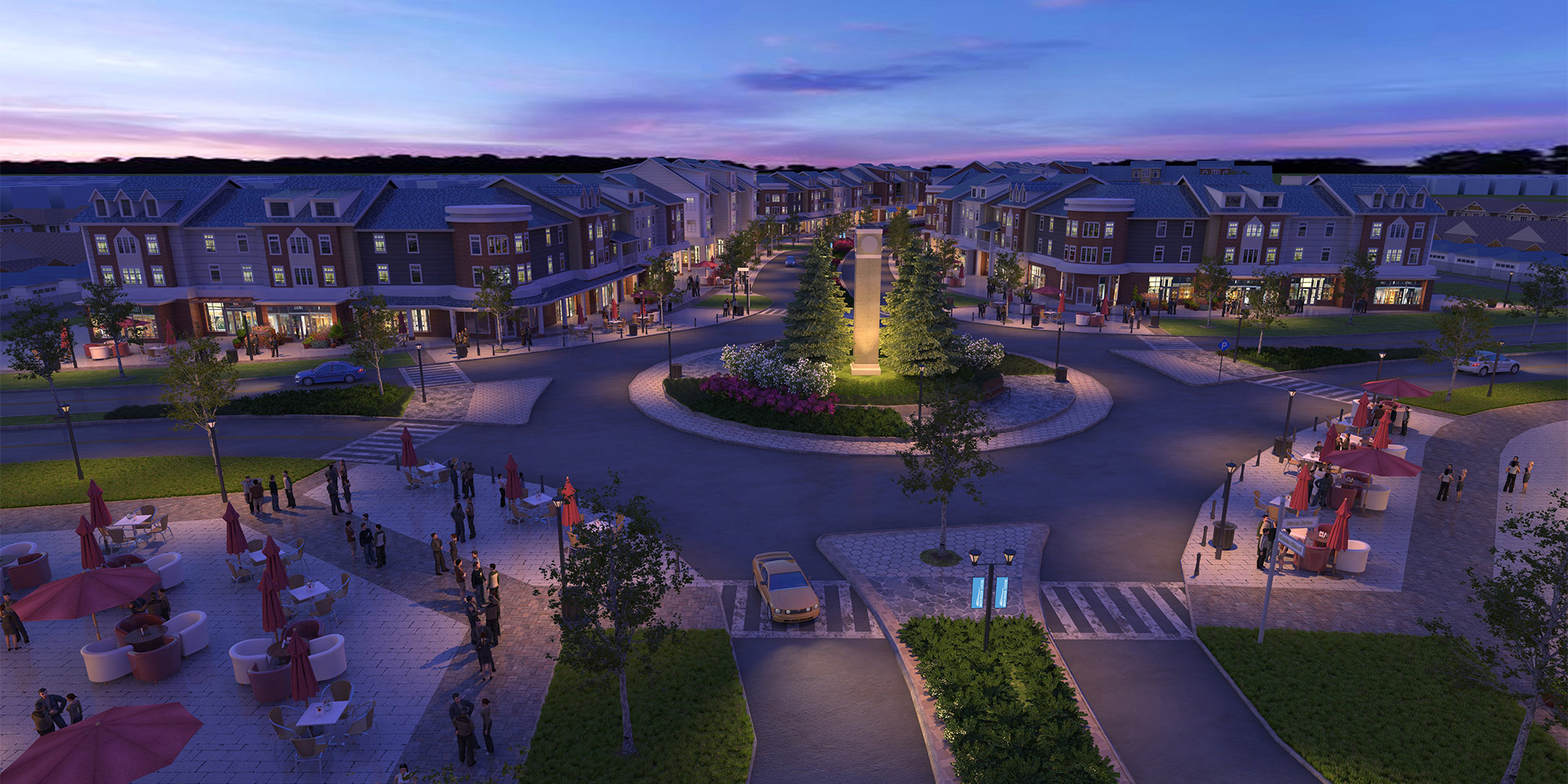 Evening visualization of a mixed-use development with illuminated retail spaces and central landscaped roundabout.