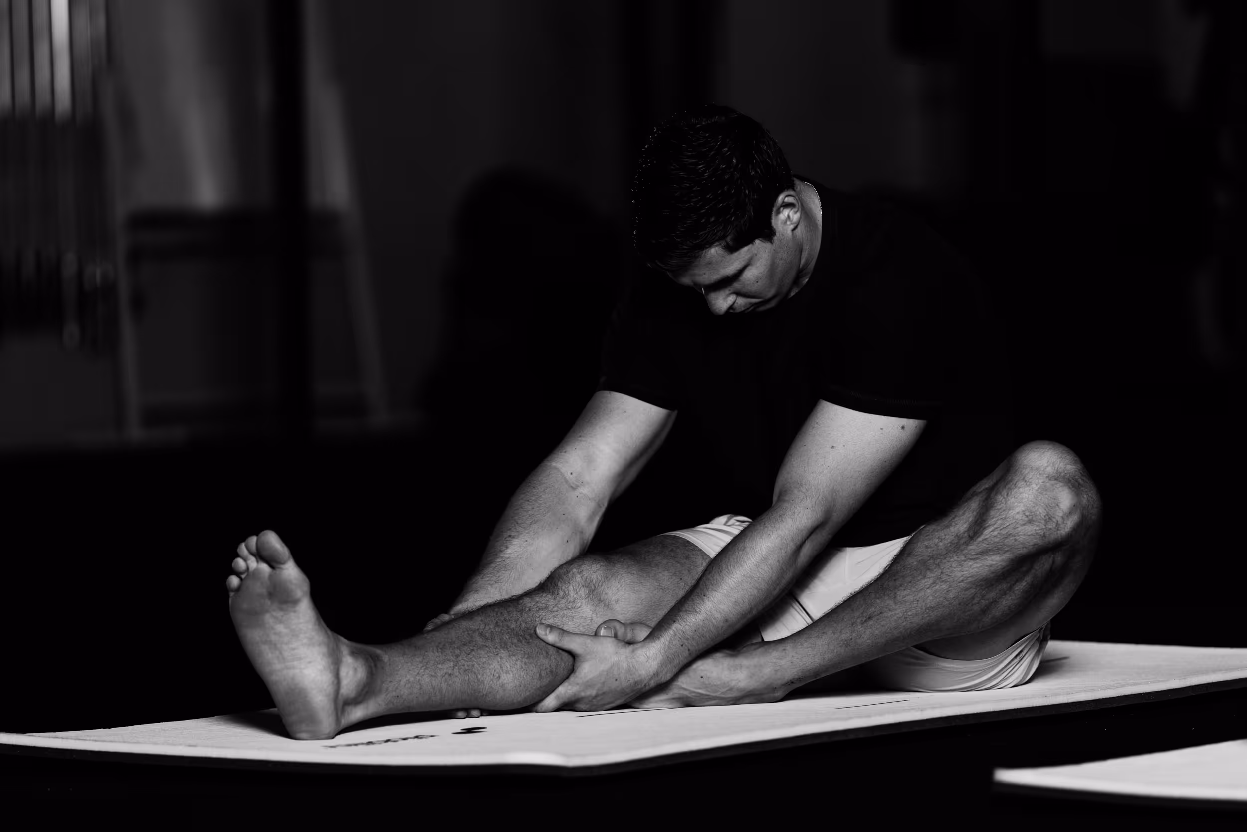 man warming up - How to Test Hip Mobility