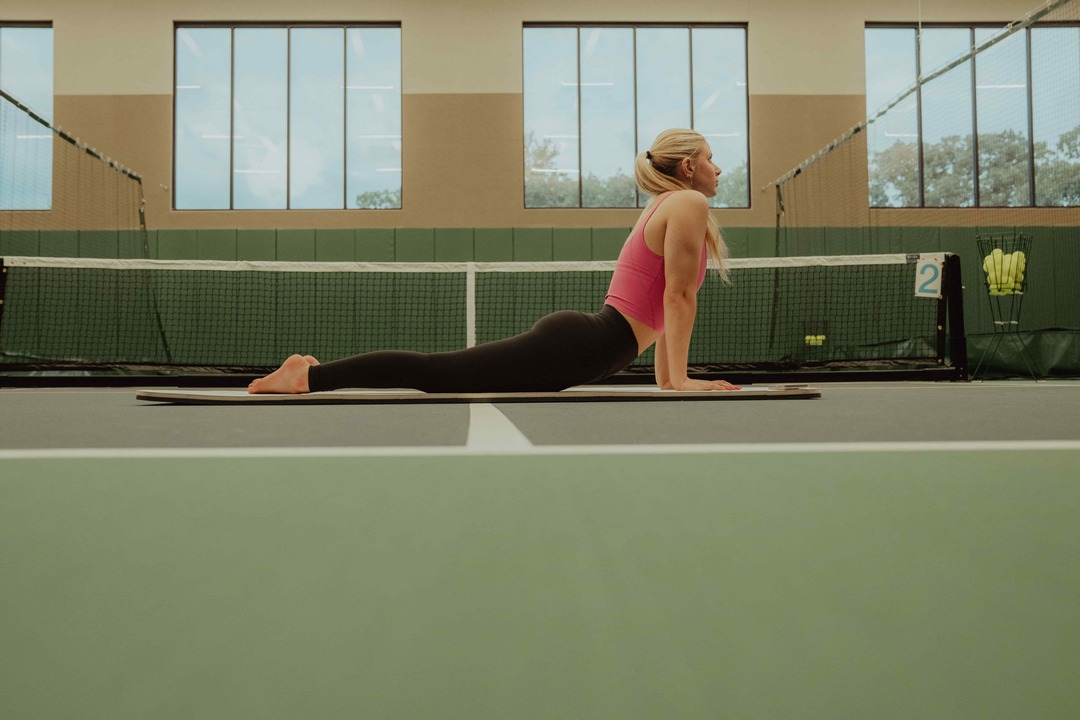 Woman Exercising on Yoga Mat - Thoracic Mobility Exercises