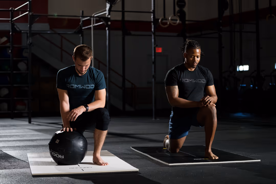 men working hard - Best Fitness Apps for Men