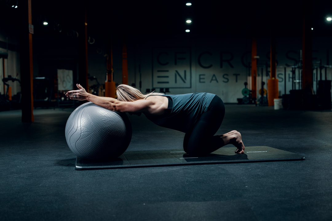 woman stretching - Basketball Injury Prevention