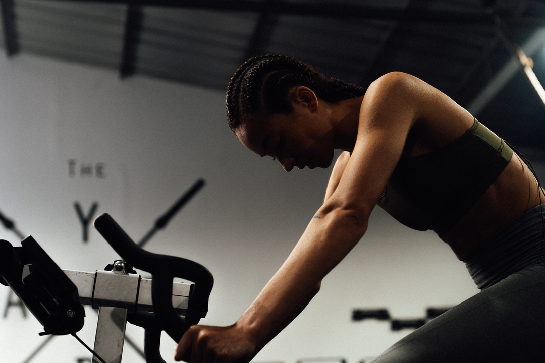 woman in gym - How Can You Prevent Injury While Cycling