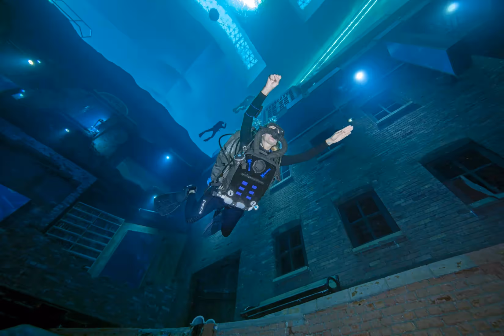 a person in a scuba gear underwater