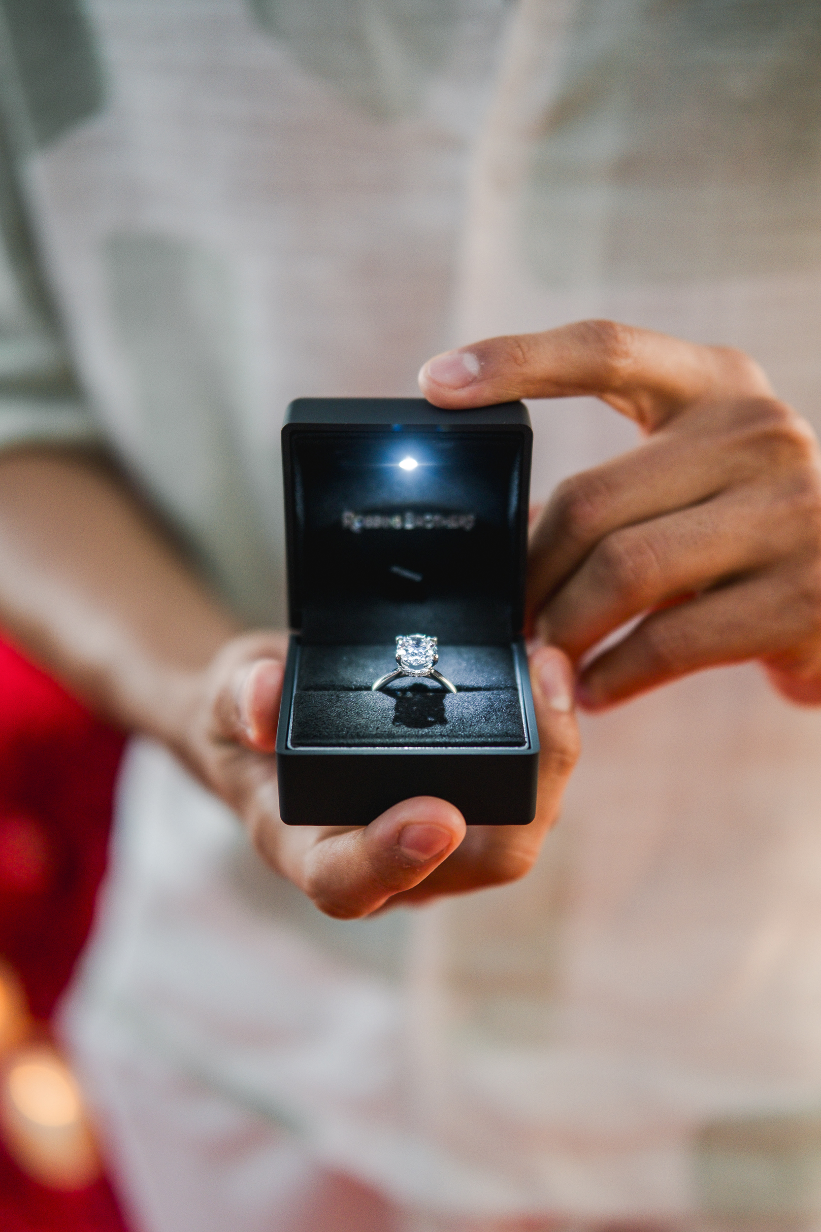 Macro detail shot of an illuminated diamond engagement ring box
