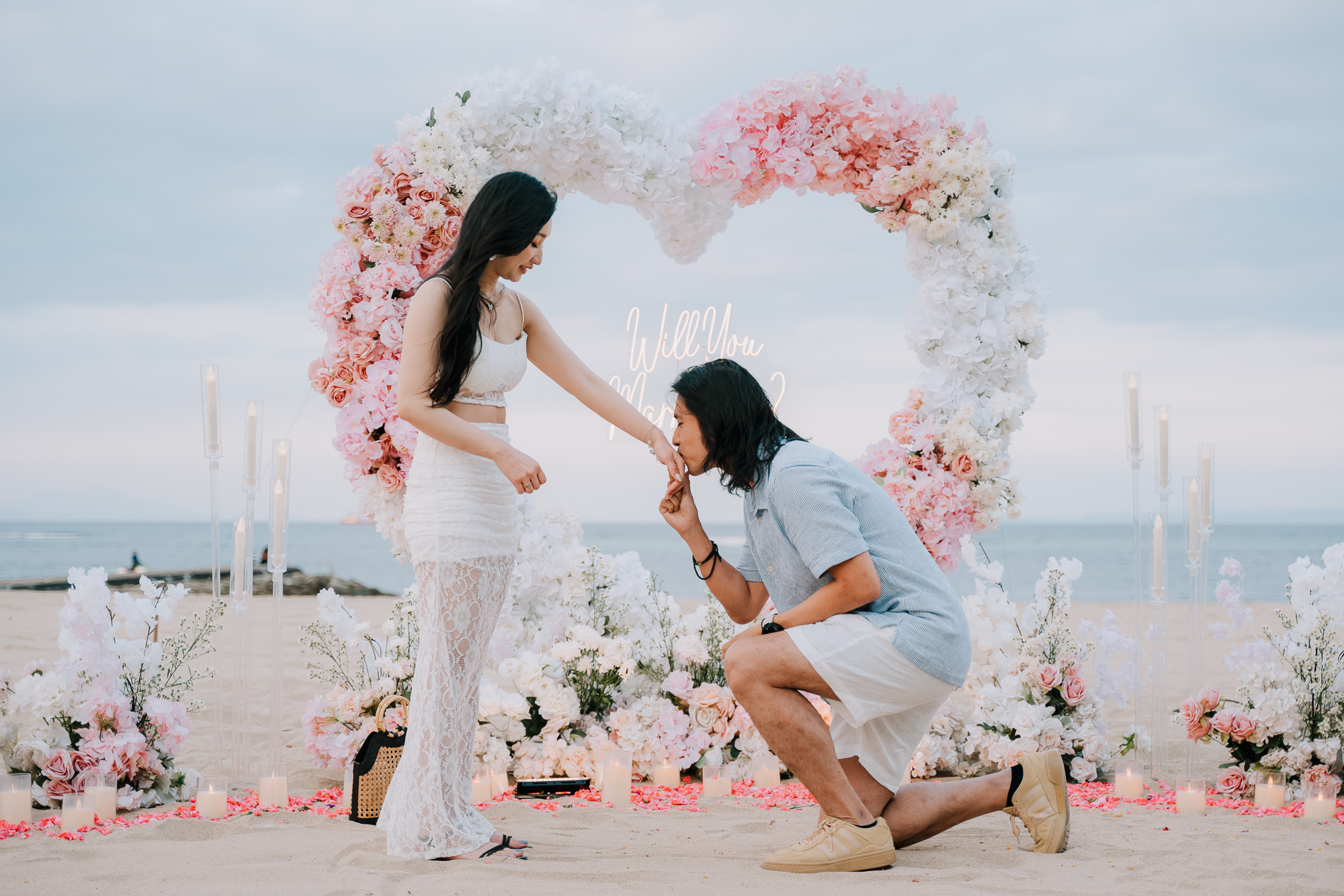Cinematic video thumbnail of a luxury surprise proposal on a Bali beach