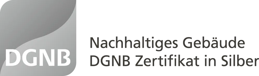 DGNB Logo mit Text 'Nachhaltiges Gebäude DGNB Zertifikat in Silber'.
