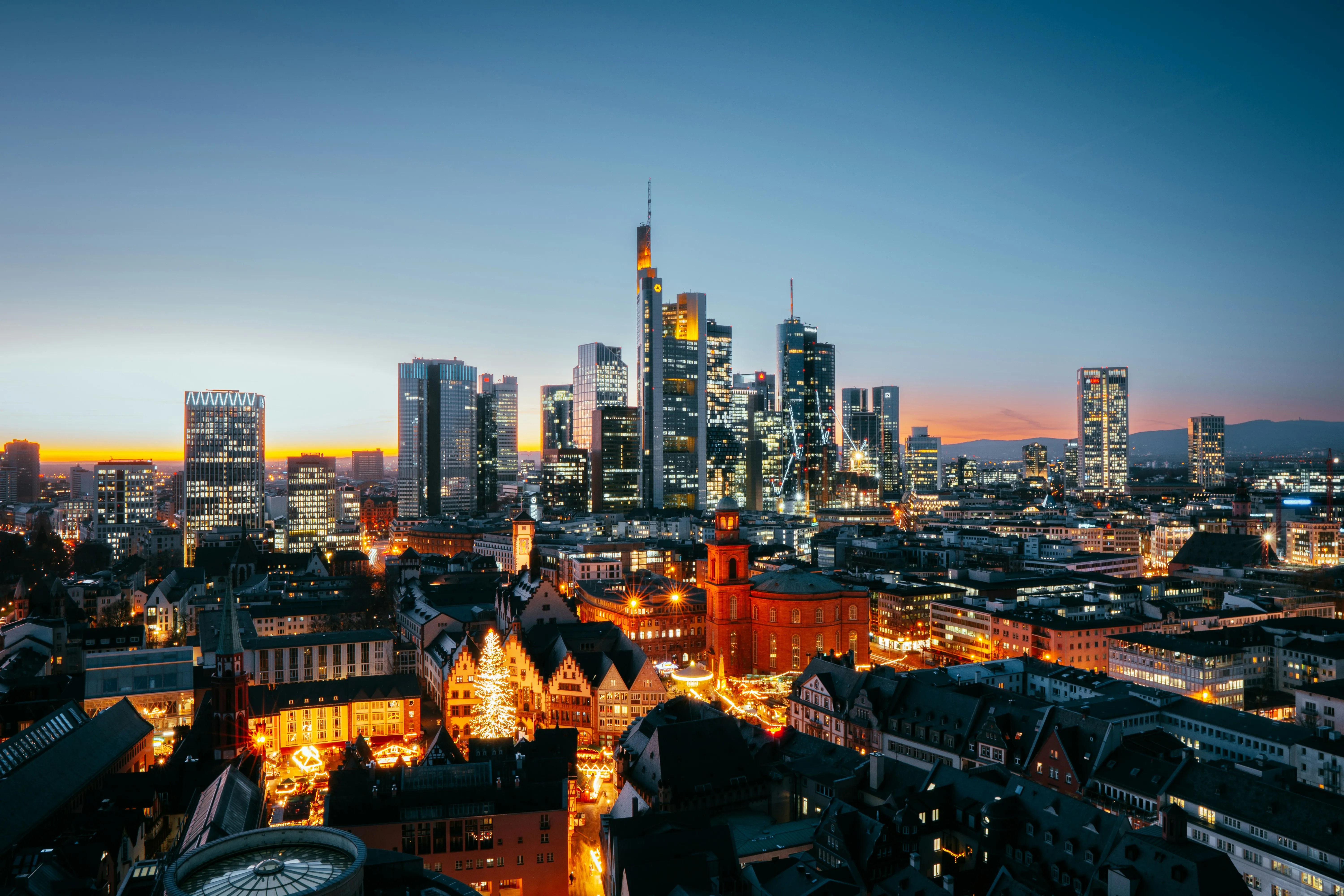 Frankfurt skyline at dusk representing sustainable building certification and urban development