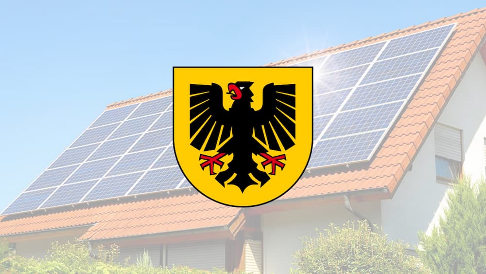 Dortmunder Stadtwappen mit Solarhaus im Hintergrund