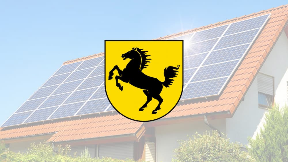 Stuttgarter Stadtwappen mit Solarhaus im Hintergrund