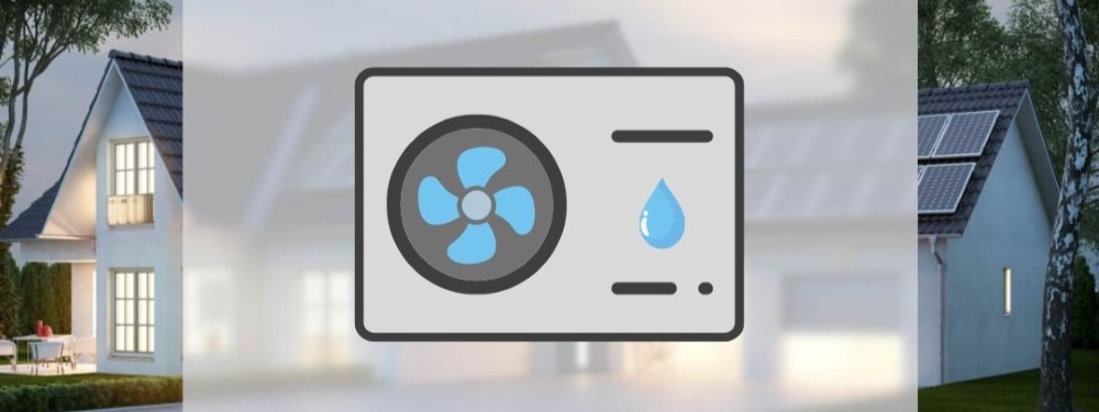 Grundwasser-Wärmepumpe mit Haus im Hintergrund