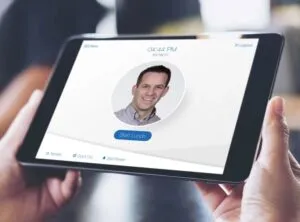 A photo of a user looking at a Paychex staff profile.