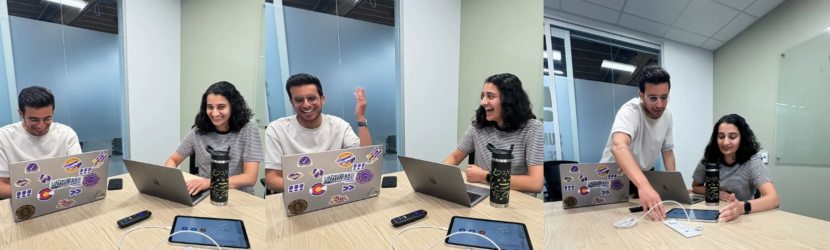 Two Homebase employees, Dana and Fadi, working away on Hiring Assistant in the Homebase office.