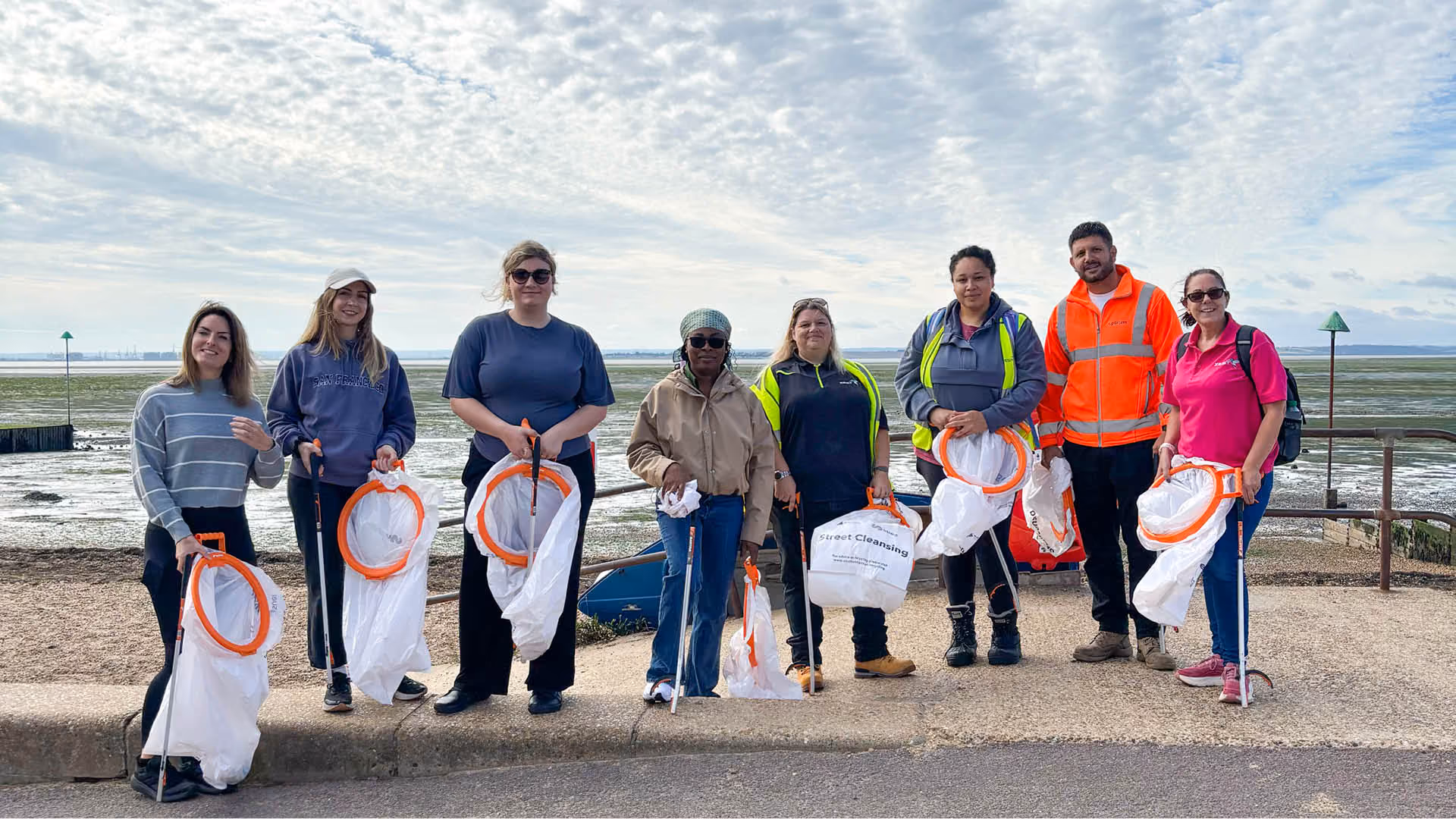 Zest and Southend City Council pose for a photo after taking part in a beach clean