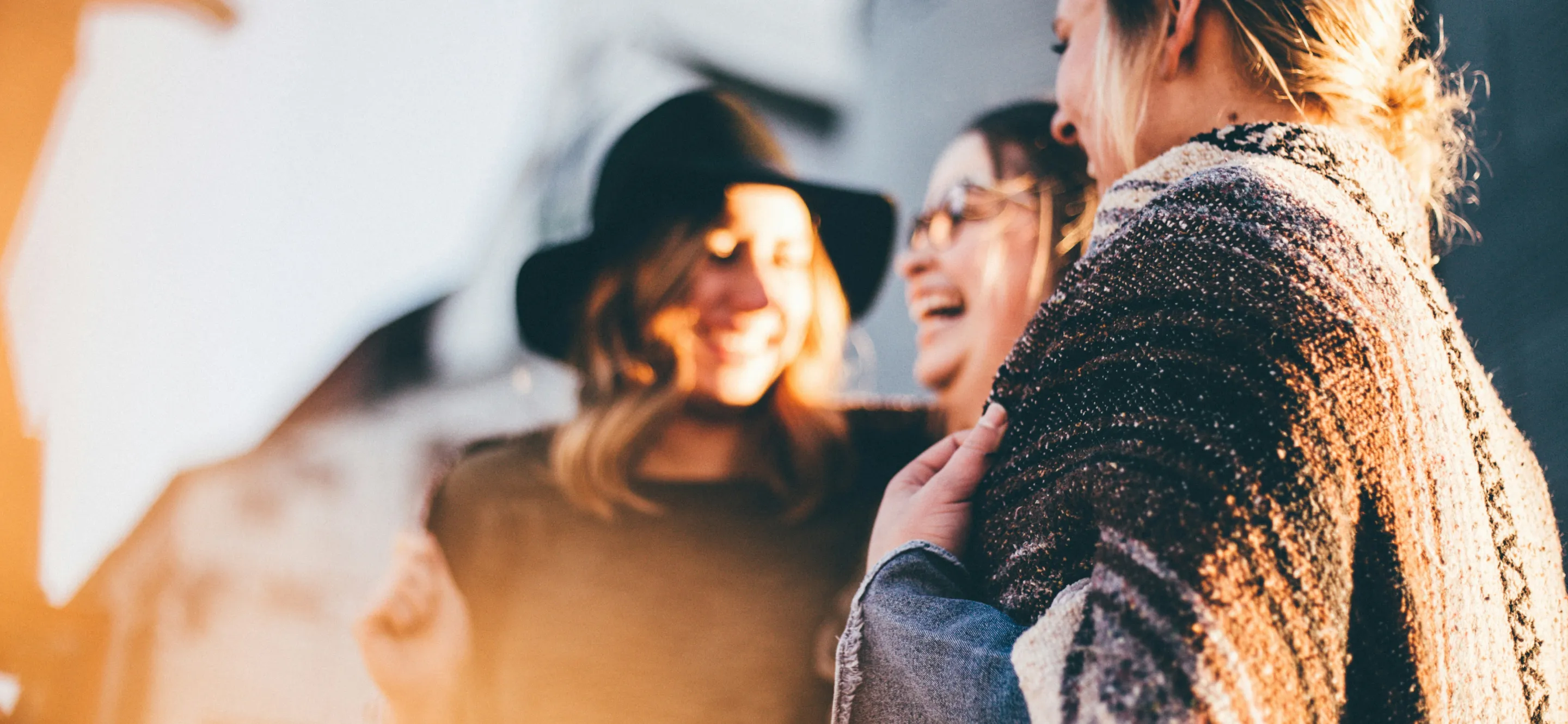 A group of women talking outside Trinity Church.