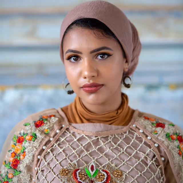 A woman in an orange dress