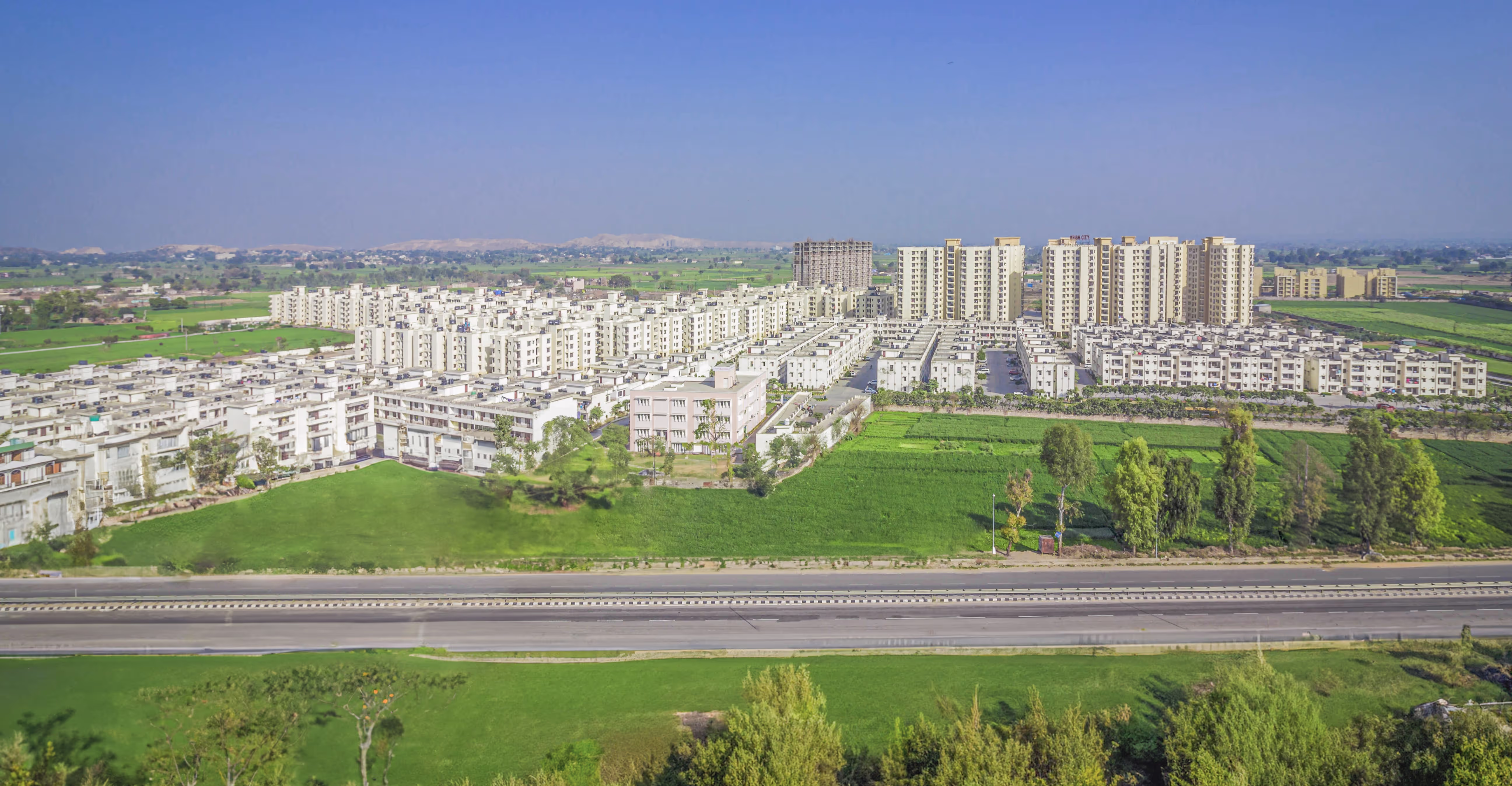 A city with buildings and greenery