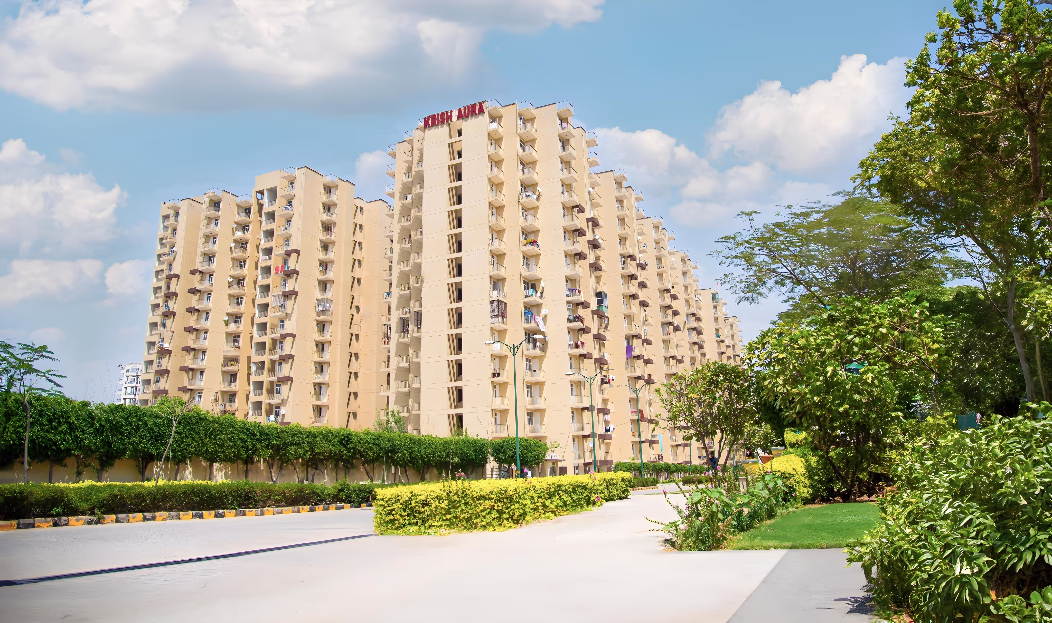 Buildings, greens and blue sky