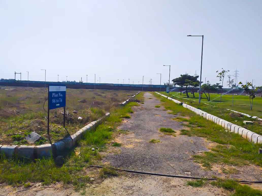 A road with a sign on the side of it.