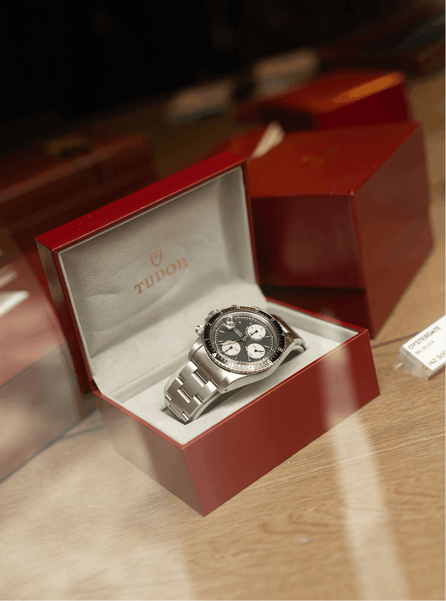 Close-up of a watch dial on display at Le Bohemian