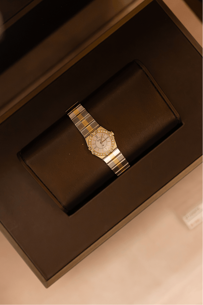 Close-up of a watch dial on display at Le Bohemian