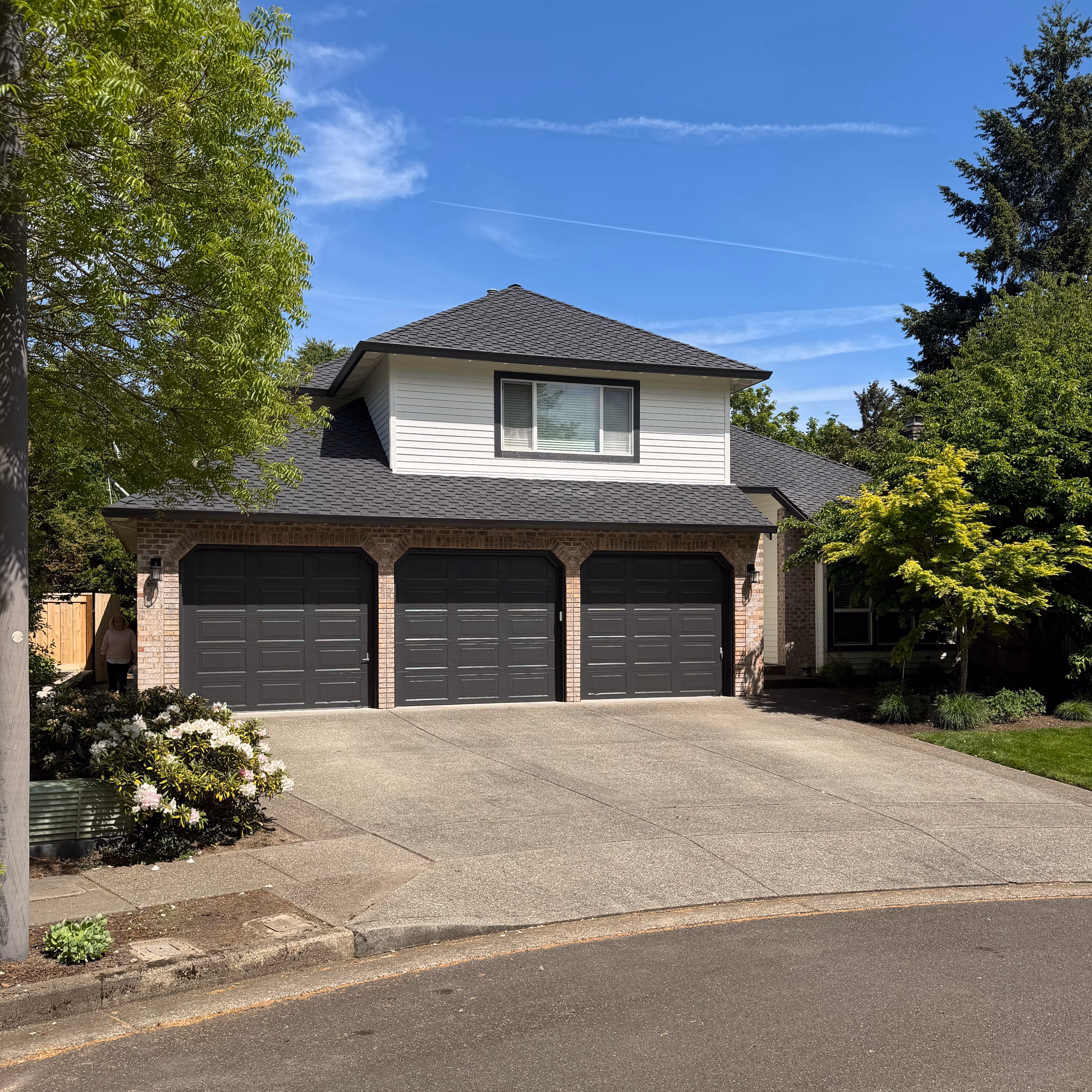 Beaverton home repaint black and white. 