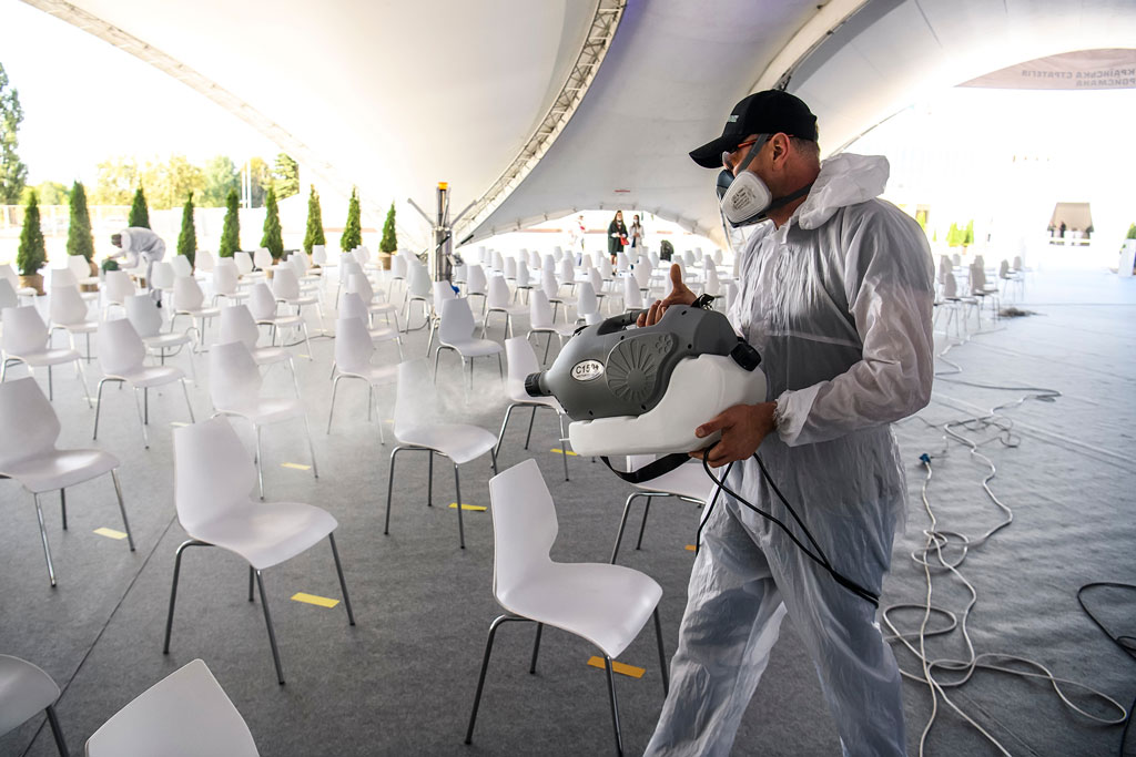 Post-event cleaning service team efficiently cleaning up after a large event or gathering