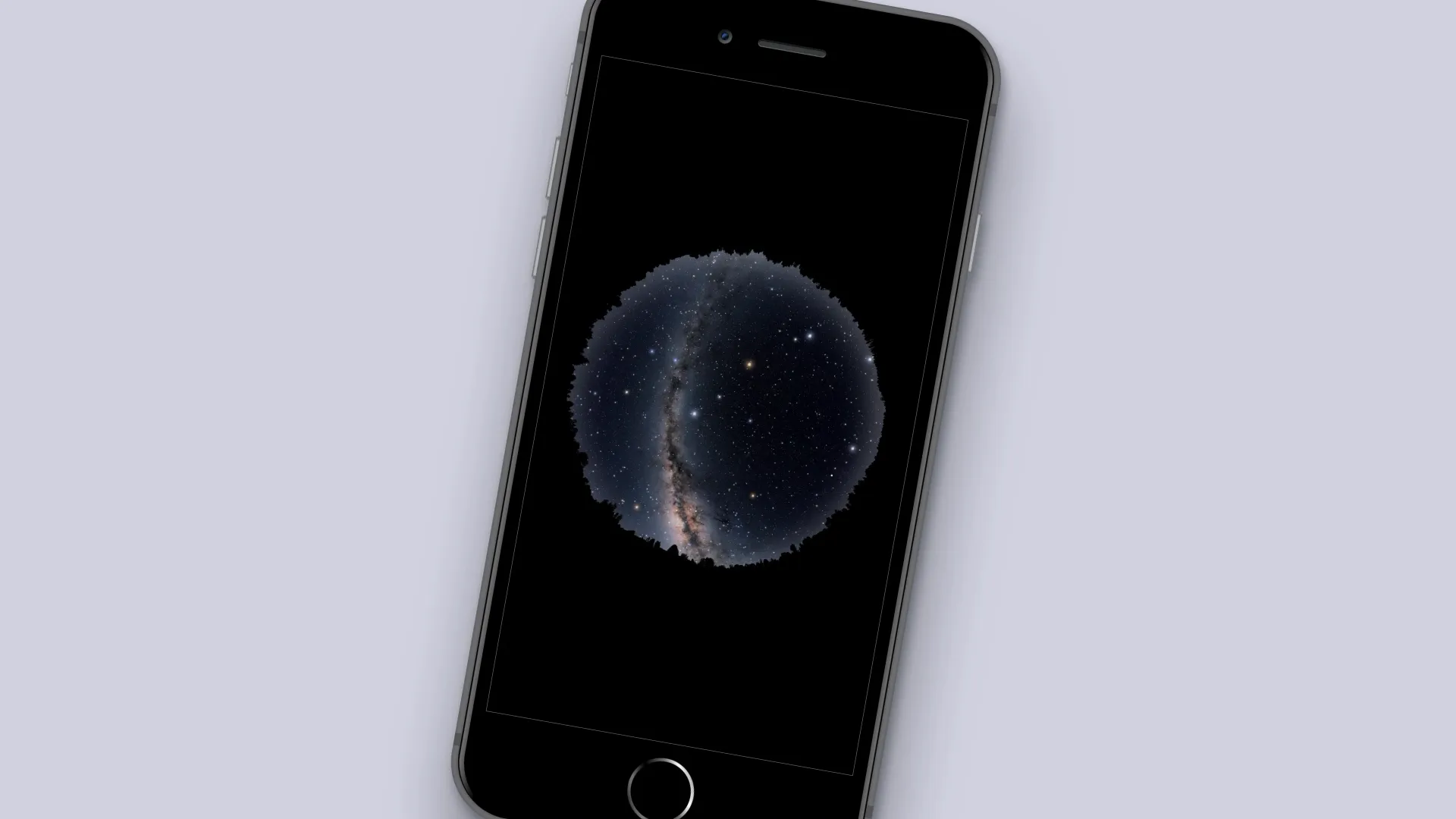 Black smartphone displaying a circular night sky image filled with stars and the Milky Way, set against a light gray background.