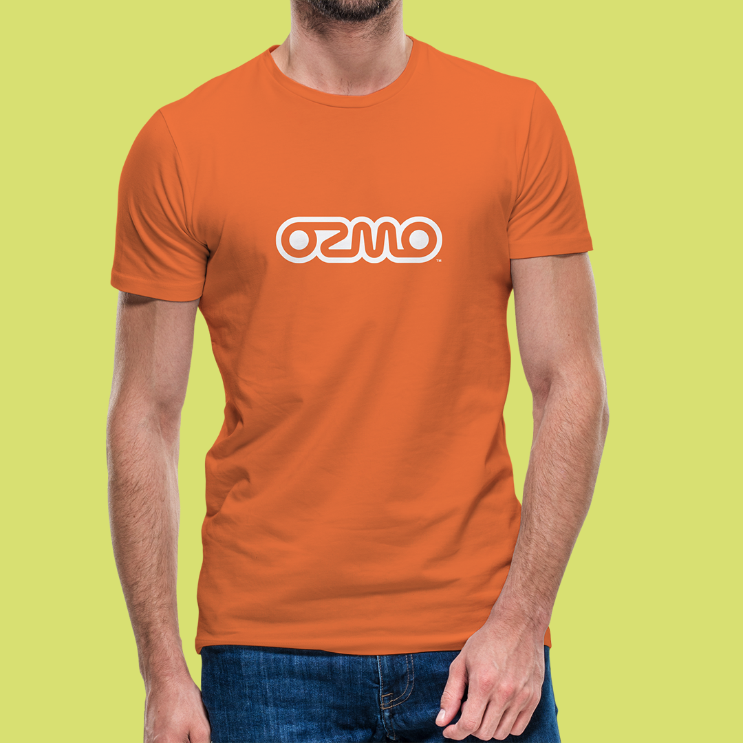Orange Ozmo logo t-shirt worn by an adult model, showcasing modern active lifestyle apparel branding.